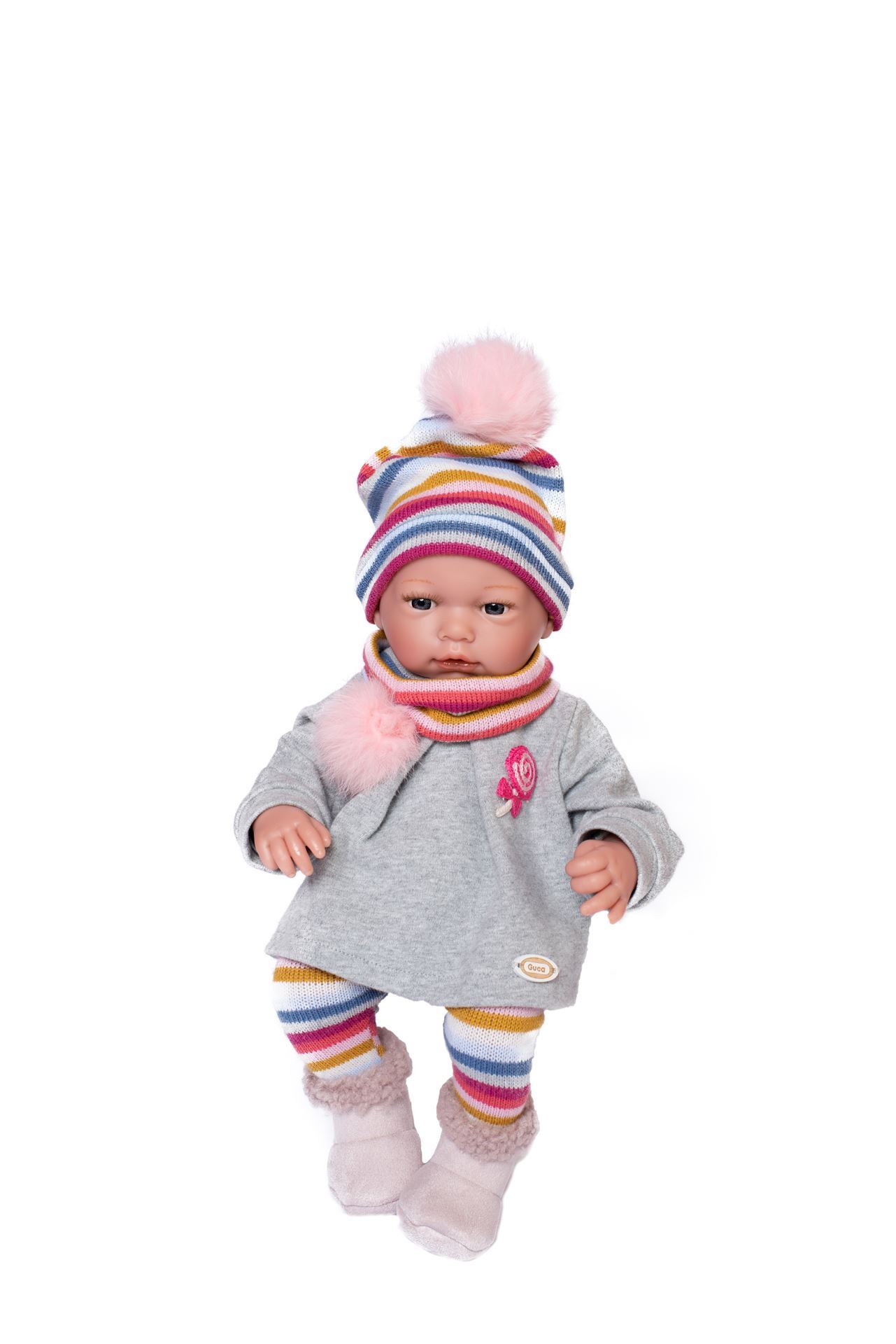 GUCA MUÑECA NATALIA CON CHAQUETA GRIS Y ACCESORIOS MULTICOLORES